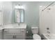 Bright bathroom with shower and tub combination, modern lighting, and vanity at 7811 Compton Ct, Charlotte, NC 28270