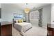 Comfortable bedroom with soft carpet, natural light, and stylish decor at 7811 Compton Ct, Charlotte, NC 28270