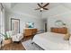 Spacious bedroom with tray ceiling, hardwood floors, and contemporary decor at 7811 Compton Ct, Charlotte, NC 28270