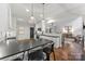 Modern kitchen featuring black granite countertops and stainless steel appliances at 7811 Compton Ct, Charlotte, NC 28270