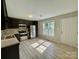 Kitchen features stainless steel appliances, dark wood cabinets, and lots of natural light at 915 Klondale Ave, Kannapolis, NC 28081