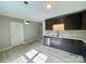 Kitchen features stainless steel appliances and dark wood cabinets at 915 Klondale Ave, Kannapolis, NC 28081