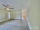 Open concept living room with carpeted floors and neutral colored walls at 915 Klondale Ave, Kannapolis, NC 28081