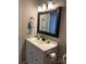 Clean bathroom with a framed mirror, stylish fixtures, and a neutral color scheme for a calming atmosphere at 11106 Harrowfield Rd, Charlotte, NC 28226