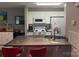 Kitchen featuring granite countertops and a breakfast bar, combining functionality with a touch of elegance at 11106 Harrowfield Rd, Charlotte, NC 28226