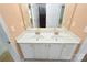 Bathroom featuring dual sinks, a white vanity, and a large mirror at 11917 Chevis Ct, Charlotte, NC 28277