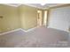 Spacious bedroom features neutral paint and carpet, complemented by a double-door closet at 11917 Chevis Ct, Charlotte, NC 28277