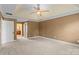 Bedroom showcasing neutral walls and carpet plus doorway views of other rooms in the home at 11917 Chevis Ct, Charlotte, NC 28277