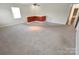 Bonus room with neutral walls and carpet, offering adaptable space for various activities at 11917 Chevis Ct, Charlotte, NC 28277
