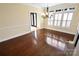 Bright living area with a chandelier and hardwood floors at 11917 Chevis Ct, Charlotte, NC 28277