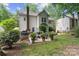 Home's backyard with fire pit and outdoor furniture, ideal for entertaining at 12328 Chickasaw Dr, Huntersville, NC 28078