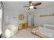 bedroom with a cozy chair, desk, and whimsical decor at 12328 Chickasaw Dr, Huntersville, NC 28078