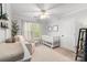 Cozy Bedroom with crib, chair, and plenty of natural light at 12328 Chickasaw Dr, Huntersville, NC 28078