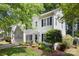 Charming two-story home boasts meticulous landscaping and a welcoming entrance at 12328 Chickasaw Dr, Huntersville, NC 28078