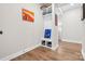 Hallway with storage cubbies and hooks, offering an organized and stylish entrance to the home at 12705 Twilight Dr, Mint Hill, NC 28227