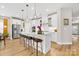 A luxurious kitchen with stainless steel appliances, a central island, and pendant lighting at 12705 Twilight Dr, Mint Hill, NC 28227
