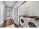 Convenient laundry area with modern washer and dryer, and wood countertop at 1517 Parkwood Ave, Charlotte, NC 28205