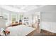 Bright playroom with hardwood floors, ample natural light, and space for creative activities at 15702 Guthrie Dr, Huntersville, NC 28078
