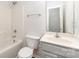 Bright bathroom featuring a shower and tub combo, vanity with sink, and updated fixtures at 1620 Crandon Dr, Charlotte, NC 28216