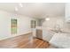 The stylish kitchen features stainless steel appliances and a view of the backyard at 1620 Crandon Dr, Charlotte, NC 28216