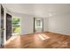Open and airy bedroom filled with natural light, featuring vinyl floors and neutral walls at 177 Candlestick Dr, Statesville, NC 28625
