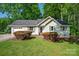 Charming single-story home with well-manicured lawn and inviting landscaping at 177 Candlestick Dr, Statesville, NC 28625