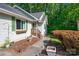 Charming front of house showcasing sidewalk and plants at 177 Candlestick Dr, Statesville, NC 28625