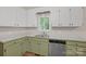 Bright kitchen featuring neutral colored countertops and stainless steel appliances at 177 Candlestick Dr, Statesville, NC 28625