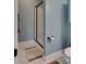 Compact bathroom featuring a shower with a glass door and neutral-toned walls at 181 Edgewater Rd, Hickory, NC 28601