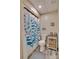 This is a well-lit bathroom with colorful decorations and a shower with a decorative curtain at 181 Edgewater Rd, Hickory, NC 28601