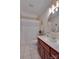 Bright bathroom with a shower-tub, vanity with wood cabinets, and decorative accents at 181 Edgewater Rd, Hickory, NC 28601