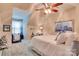 Bright bedroom with neutral tones, ceiling fan, and comfortable furnishings and decor at 181 Edgewater Rd, Hickory, NC 28601