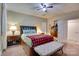 Spacious bedroom with a plush bed, dark wood furniture, and neutral wall colors at 181 Edgewater Rd, Hickory, NC 28601