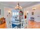 Open-concept dining room with hardwood floors and a view of living spaces for easy entertaining at 181 Edgewater Rd, Hickory, NC 28601