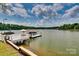 Lakefront dock with boat storage and lake access provides waterfront enjoyment and convenience at 181 Edgewater Rd, Hickory, NC 28601