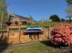 Lakeside house featuring convenient kayak storage and a scenic view from the backyard at 181 Edgewater Rd, Hickory, NC 28601