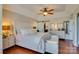 Spacious main bedroom featuring hardwood floors, a tray ceiling, and ample natural light at 181 Edgewater Rd, Hickory, NC 28601