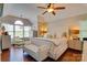 Relaxing main bedroom with a seating area, large window, and hardwood floors at 181 Edgewater Rd, Hickory, NC 28601