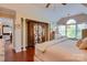 Bright main bedroom suite features hardwood floors, and vaulted ceiling for a luxurious feel at 181 Edgewater Rd, Hickory, NC 28601