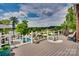 Spacious outdoor deck with multiple seating areas and panoramic lake views at 181 Edgewater Rd, Hickory, NC 28601