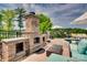 Outdoor fireplace, ideal for entertaining, with lovely lake views and comfortable seating at 181 Edgewater Rd, Hickory, NC 28601