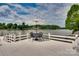 Lakefront deck with table and umbrella offers serene views and a relaxing outdoor experience at 181 Edgewater Rd, Hickory, NC 28601