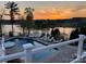 Stunning lakeside pool with a hot tub and ample lounge seating, perfect for enjoying sunsets at 181 Edgewater Rd, Hickory, NC 28601