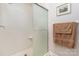 Clean bathroom with a glass-enclosed shower, accented by a soft towel and tasteful wall decor creating a relaxed experience at 182 Meek Rd, Gastonia, NC 28056