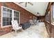 Spacious covered patio with comfortable seating, offering a great spot for outdoor gatherings and leisure at 182 Meek Rd, Gastonia, NC 28056