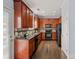 Well-equipped kitchen features stainless steel appliances, granite countertops, and tile backsplash at 1948 Winpole Ln, Charlotte, NC 28273