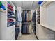 Well-organized walk-in closet with custom shelving and ample storage space at 1948 Winpole Ln, Charlotte, NC 28273