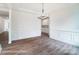 Elegant dining room boasts wainscoting, wood floors, and butler's pantry at 2028 Cedar Falls Dr # 10, Waxhaw, NC 28173