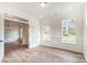 Bright living room featuring wainscoting and hardwood floors at 2028 Cedar Falls Dr # 10, Waxhaw, NC 28173