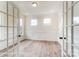 Charming living room featuring wainscoting and hardwood floors at 2028 Cedar Falls Dr # 10, Waxhaw, NC 28173